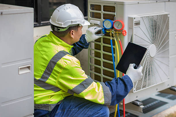 Professional Ac Installation technician working in Bogota, TN